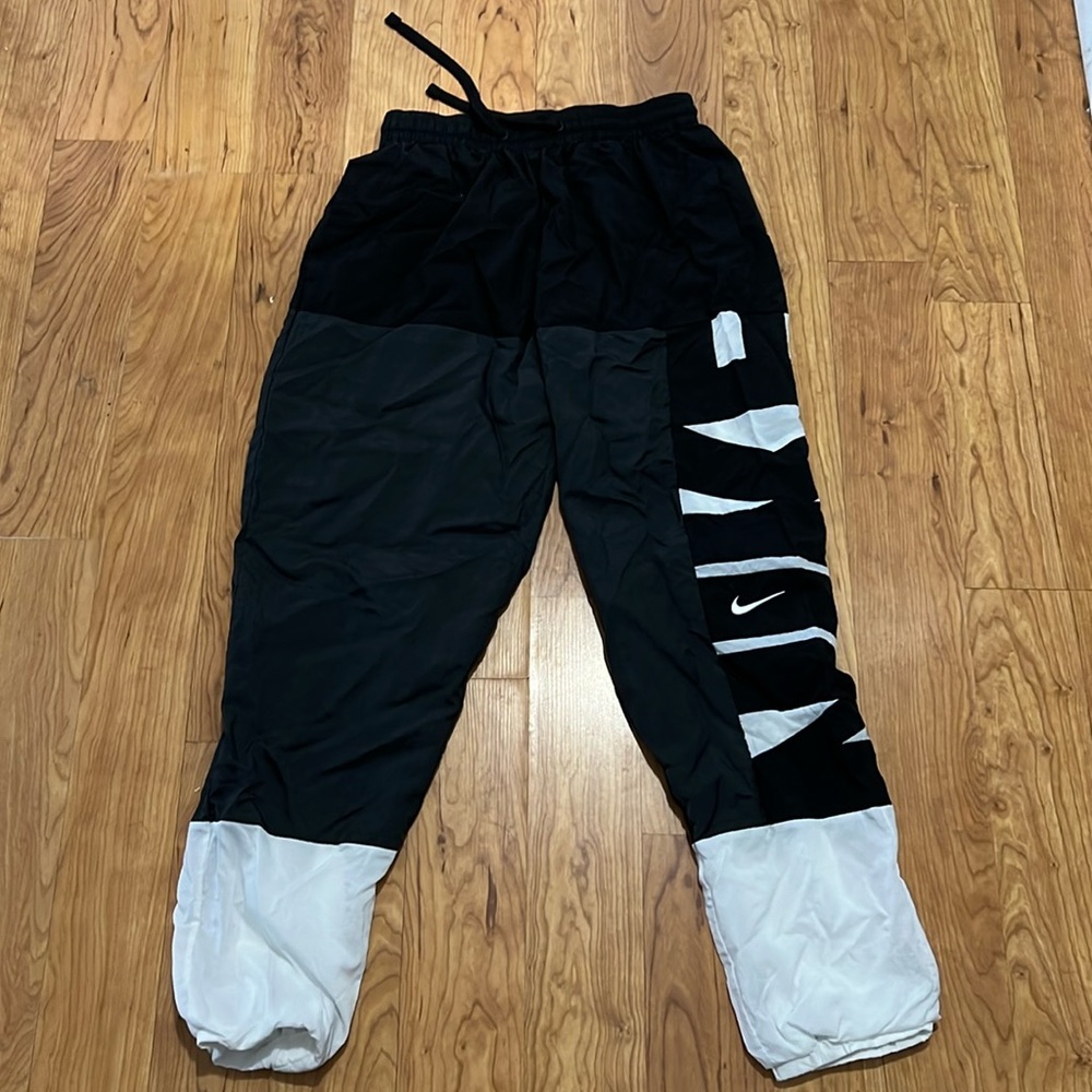 Nike swoosh pant.